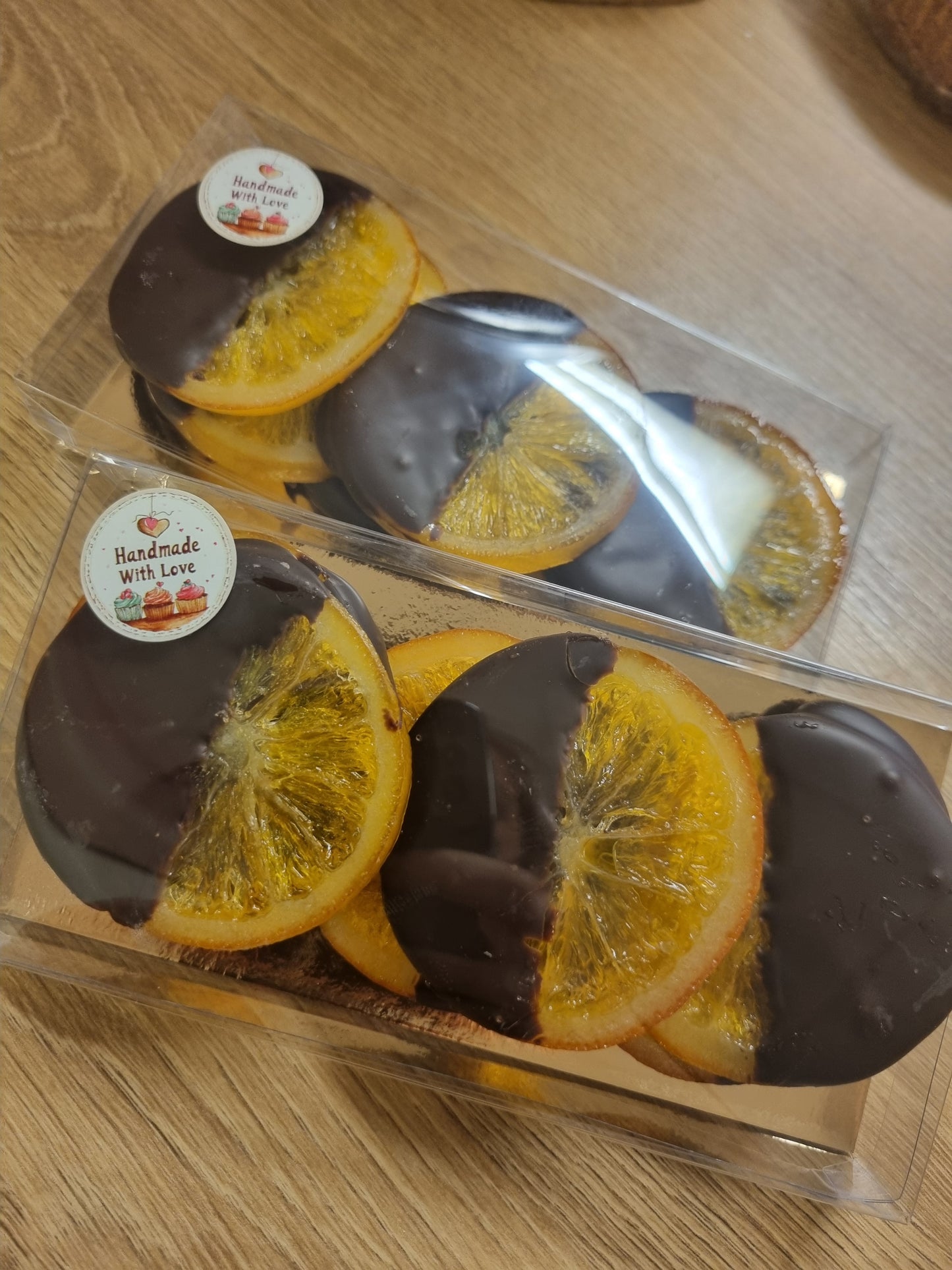 Geconfijte sinasschijven met chocola